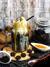 Close-up of drink in jar on table