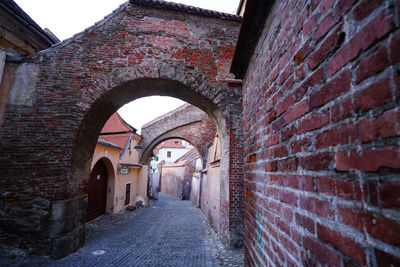 Narrow alley amidst old buildings
