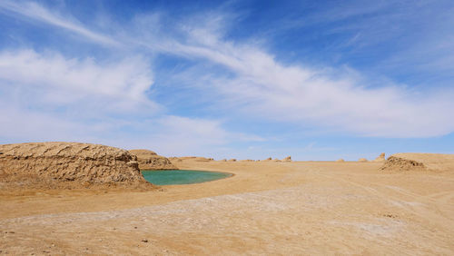 Panoramic view of desert against sky