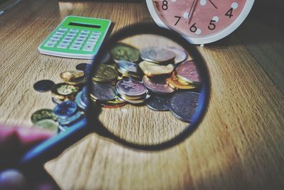 High angle view of coins on table