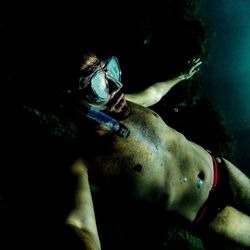 High angle view of man swimming in sea