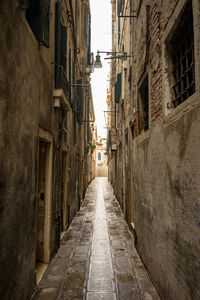 Narrow alley along buildings