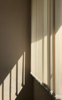 Sunlight falling on wall at home