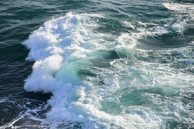 High angle view of waves in sea