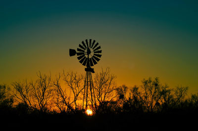 Sundown behind old windmill