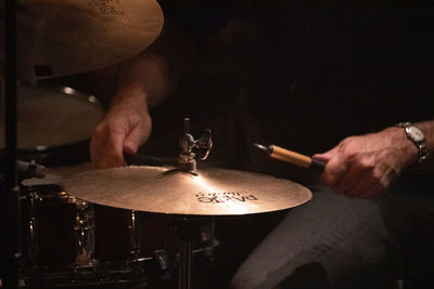 Man playing lit up at night