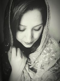 Close-up of young woman smiling