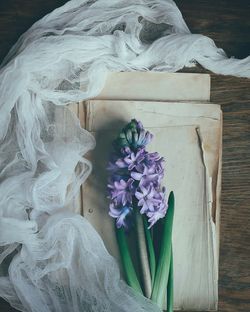 Close-up of bouquet on white table