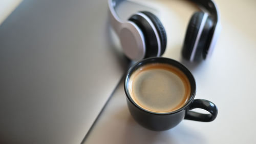 High angle view of coffee cup on table