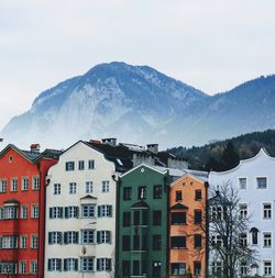 Buildings in city against sky