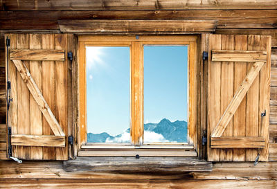 Mountains seen through window