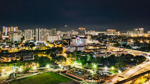 High angle view of illuminated buildings in kuala lumpur city at night