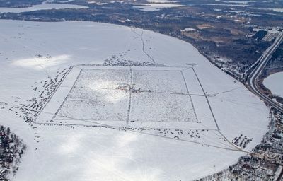 Aerial view of snow covered land