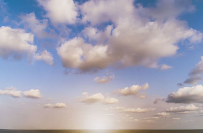 Low angle view of cloudy sky over sea