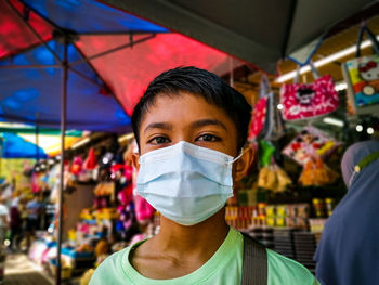 Portrait of boy wearing mask