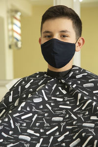 Portrait of boy at barber shop