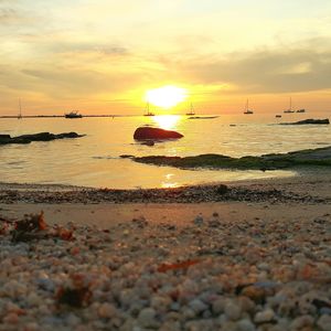 Scenic view of sea at sunset