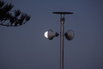 Low angle view of lamp post against clear sky