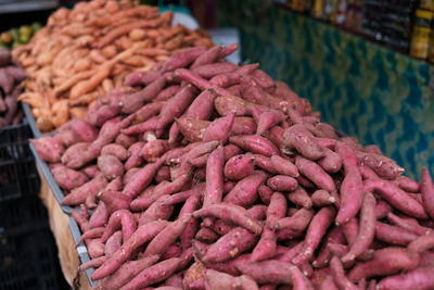 Close-up of red chili peppers for sale at market stall