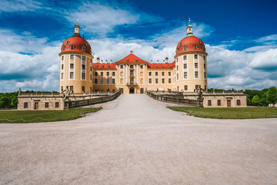 View of historic building against cloudy sky