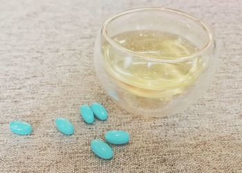 High angle view of drink in glass on table