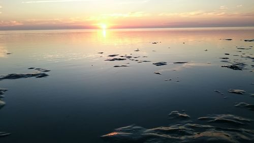 Scenic view of sunset over sea