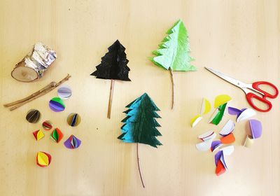 High angle view of multi colored paper on table