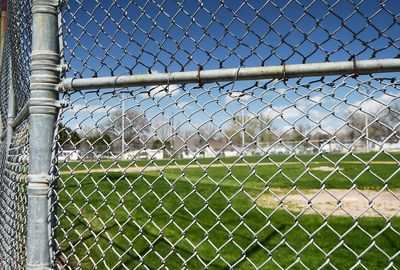 Chainlink fence against sky