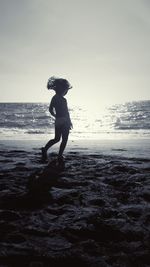 Rear view of a girl on beach