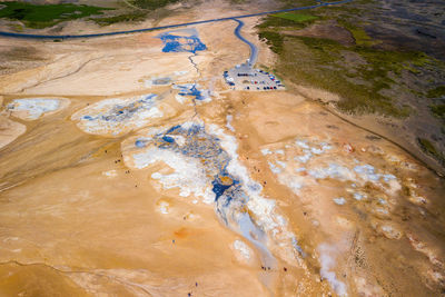 High angle view of footprints on shore