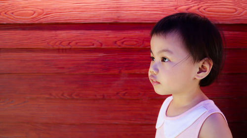 3 years old cute baby asian girl, little toddler child with adorable looking at copy space.