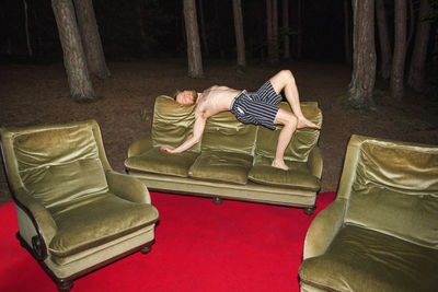 Boy sleeping on sofa