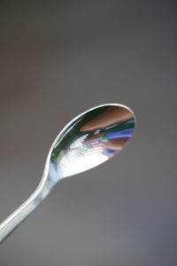 Close-up of bubble against black background