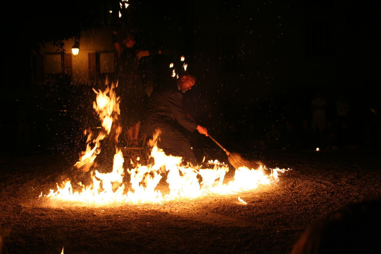 VIEW OF BONFIRE AT NIGHT ON FIELD