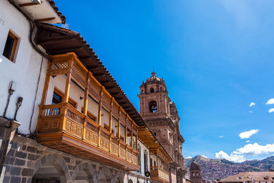 Low angle view of la compania against blue sky