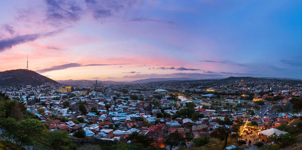 Sunset panorama view of tbilisi, capital of georgia country, from narikala fortress. 