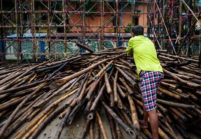 Rear view of man working at construction site