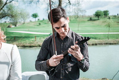 Young man using mobile phone