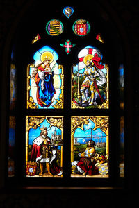 Graffiti on glass window of cathedral