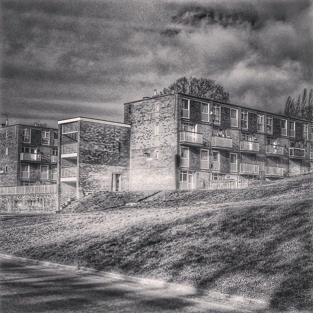 architecture, building exterior, built structure, sky, abandoned, cloud - sky, obsolete, old, damaged, cloudy, run-down, deterioration, house, building, residential structure, weathered, overcast, day, outdoors, window