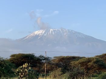 Scenic view of snowcapped mountains against sky
mount kilimanjaro