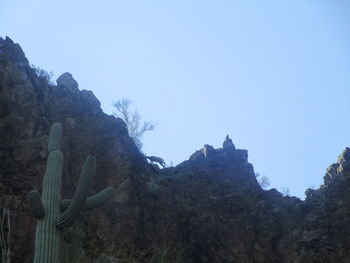 Scenic view of mountains against clear blue sky