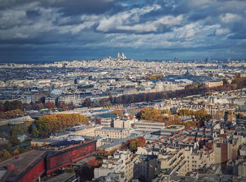 Panoramic view over the paris city to the sacre coeur de montmartre basilica on the hill, france