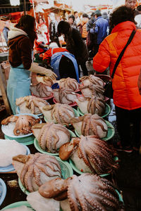 Man buying fish at market