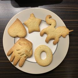 High angle view of cookies in plate on table