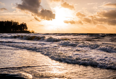 Scenic view of sea against sky during sunset