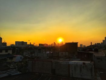 View of cityscape at sunset