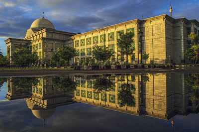 Reflection of building in water