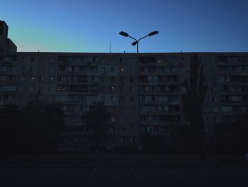 Street and buildings against sky