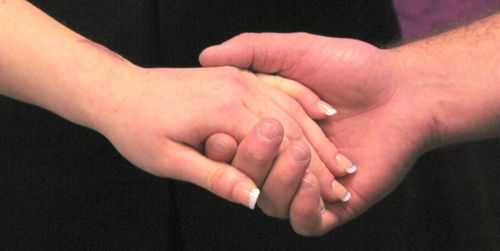 Close-up of woman holding baby